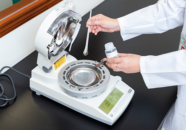 a tester is conducting careful chemical analysis